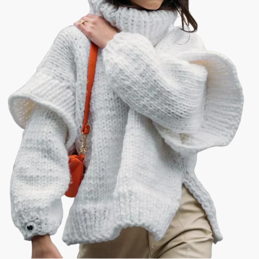 Women's chunky knit oversized roll neck sweater with ribbed hem and statement lantern sleeves