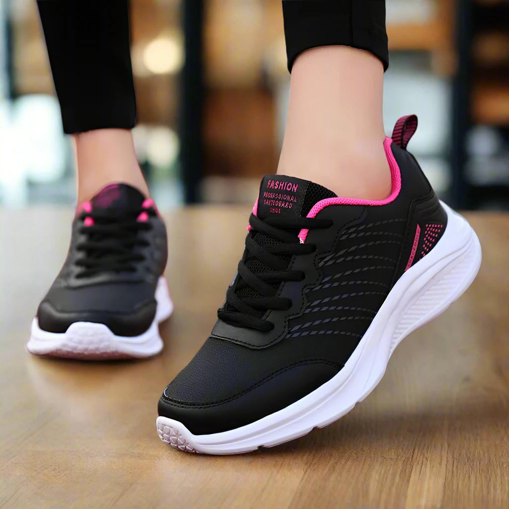 Women's lightweight lace-up sneakers with breathable mesh upper and cushioned sole for all-day comfort