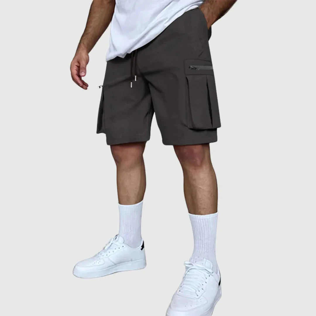 Men's khaki multi-pocket utility cargo shorts with secure zip pockets and breathable poly-blend fabric