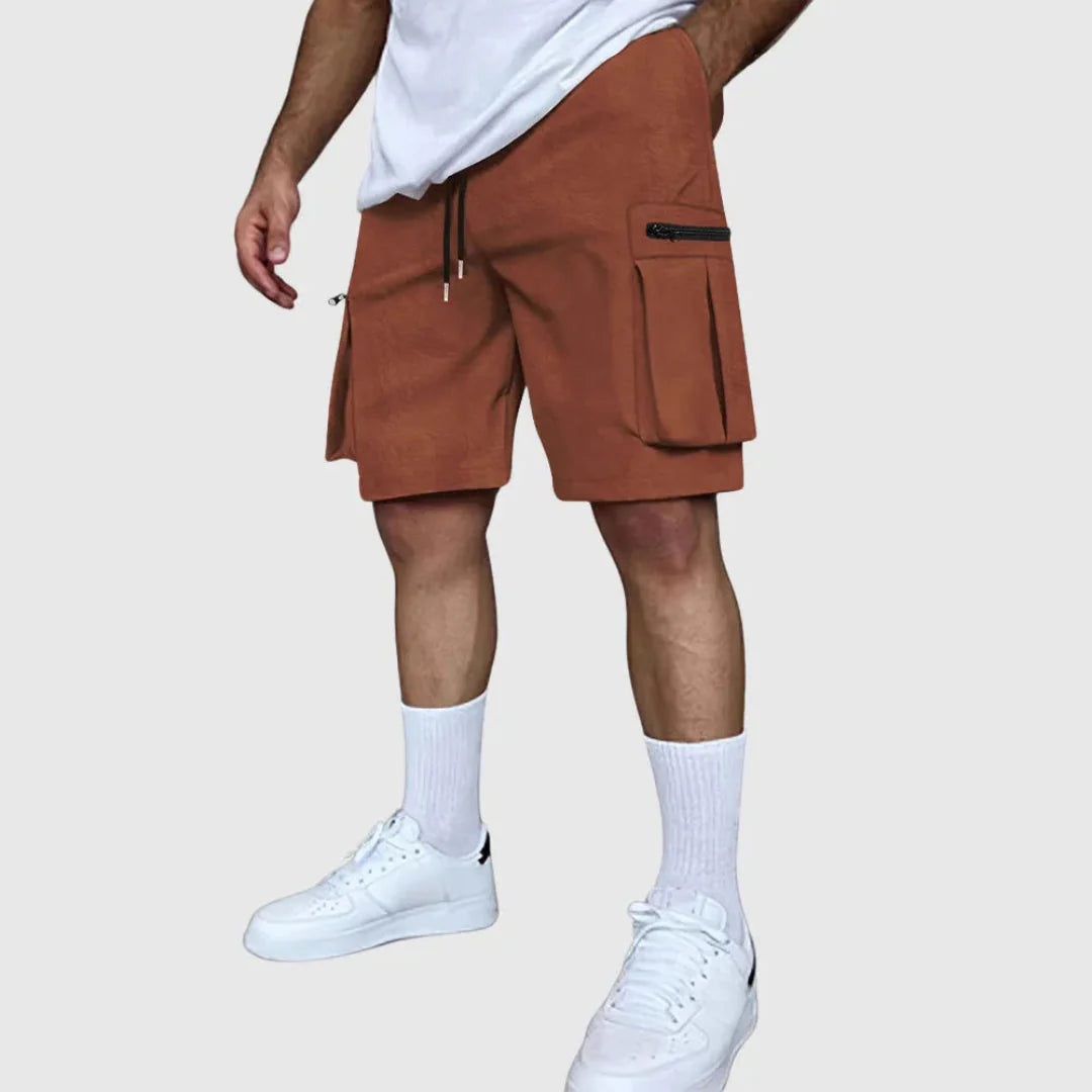Men's khaki multi-pocket utility cargo shorts with secure zip pockets and breathable poly-blend fabric