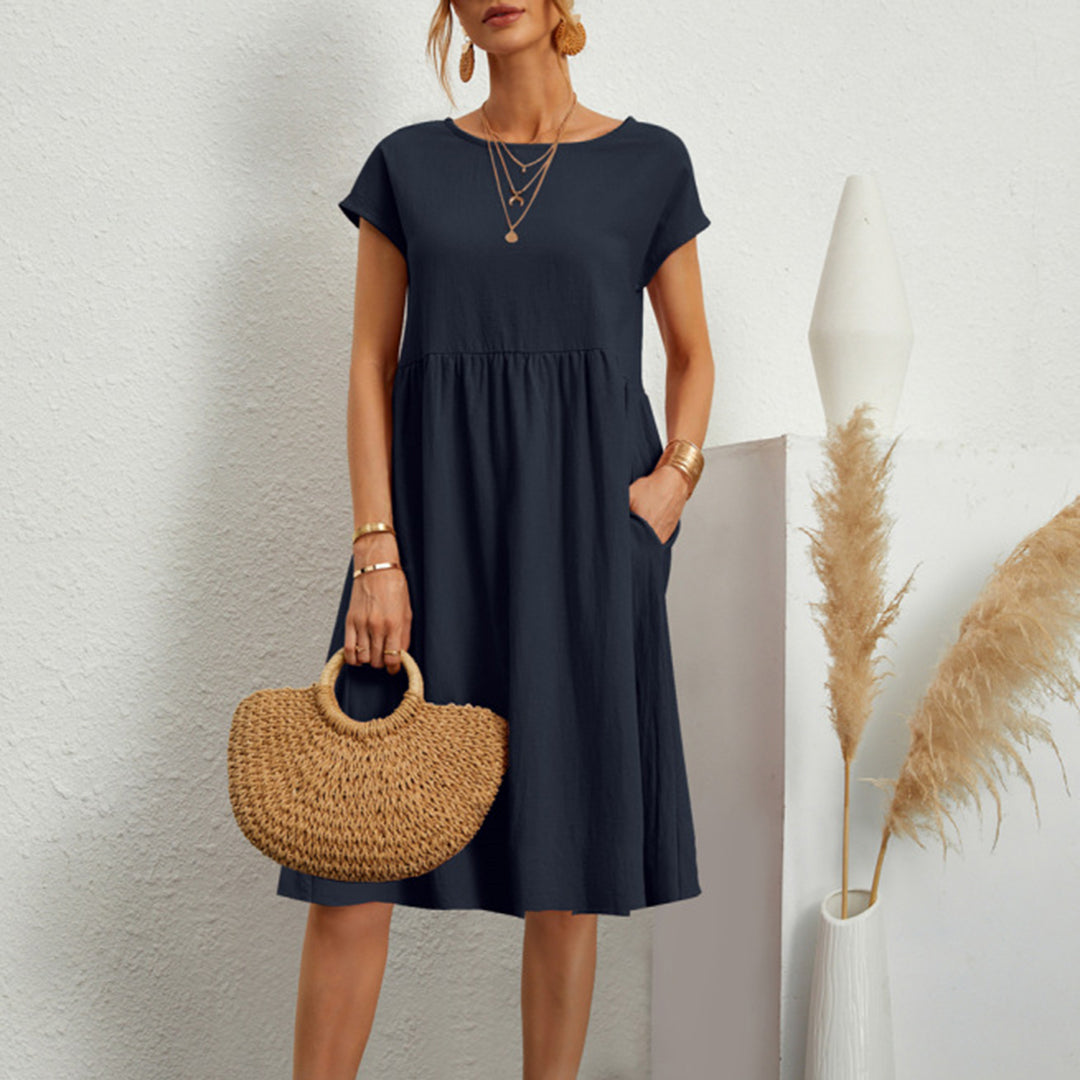 Women's A-line midi dress in versatile solid color, flattering mid-calf length for everyday wear