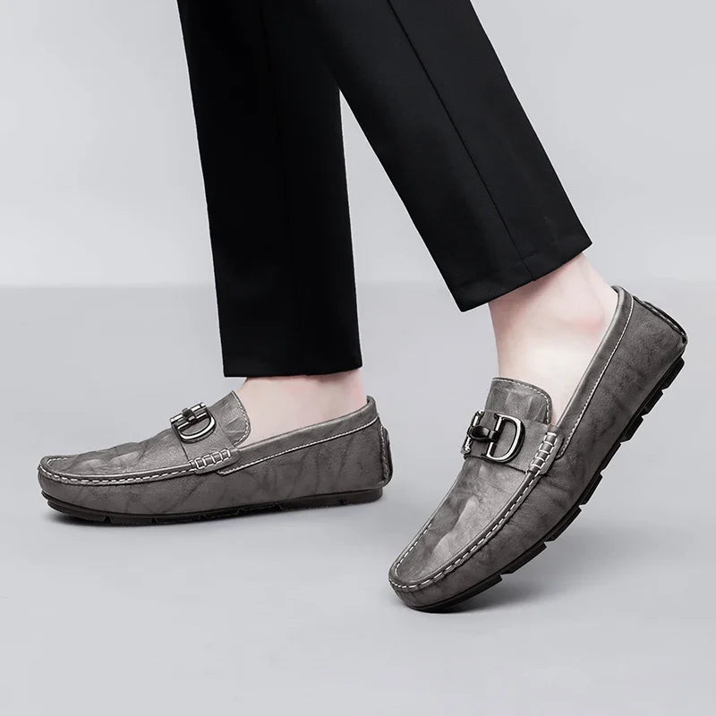 Brown distressed genuine leather loafers with polished metal buckle, handcrafted professional style