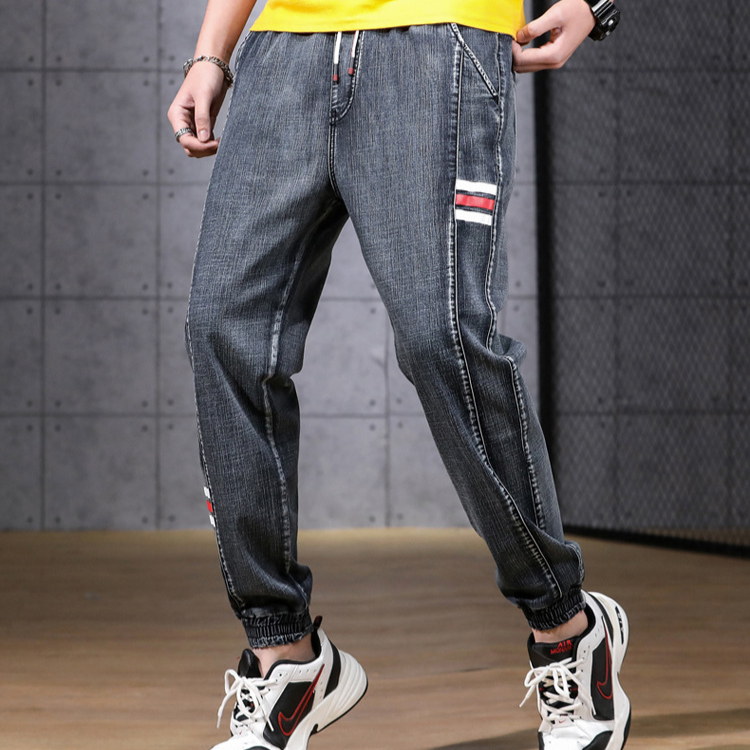 Men's light blue denim cargo joggers elastic waistband striped accents lightweight relaxed fit