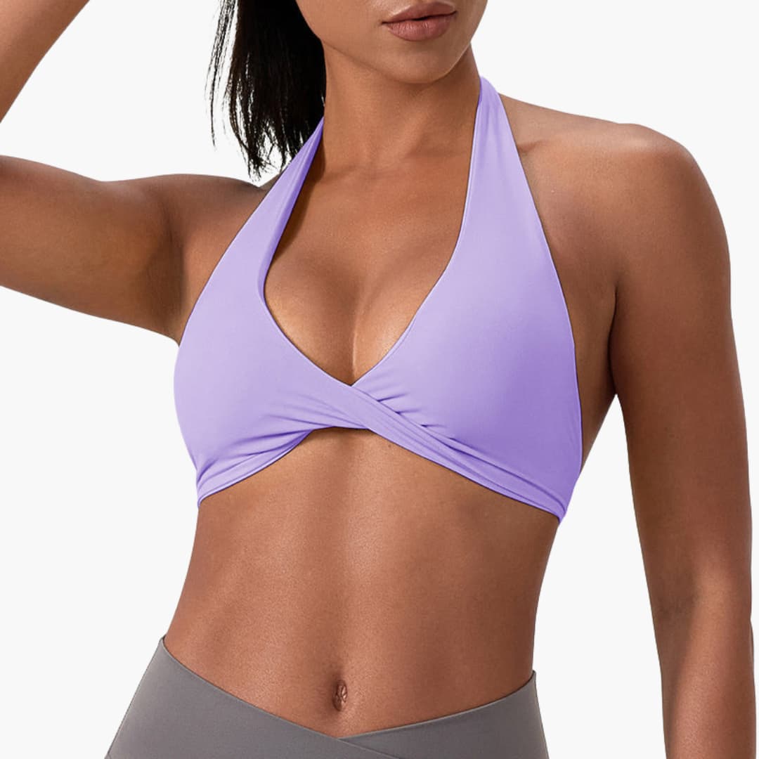 Women's high-neck sleeveless sports tank top with fixed collar, support band, and smooth surface