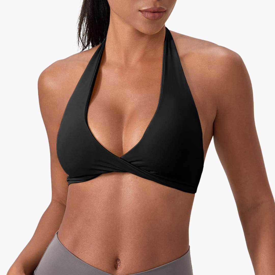 Women's high-neck sleeveless sports tank top with fixed collar, support band, and smooth surface