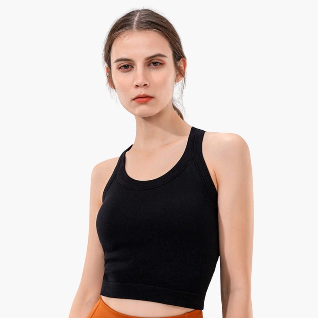 Women's fitted ribbed sleeveless sports tank top in racerback style for active training comfort
