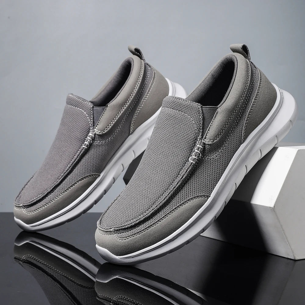 Breathable slip-on loafers with mesh suede-like panels and cushioned flexible sole for all-day comfort