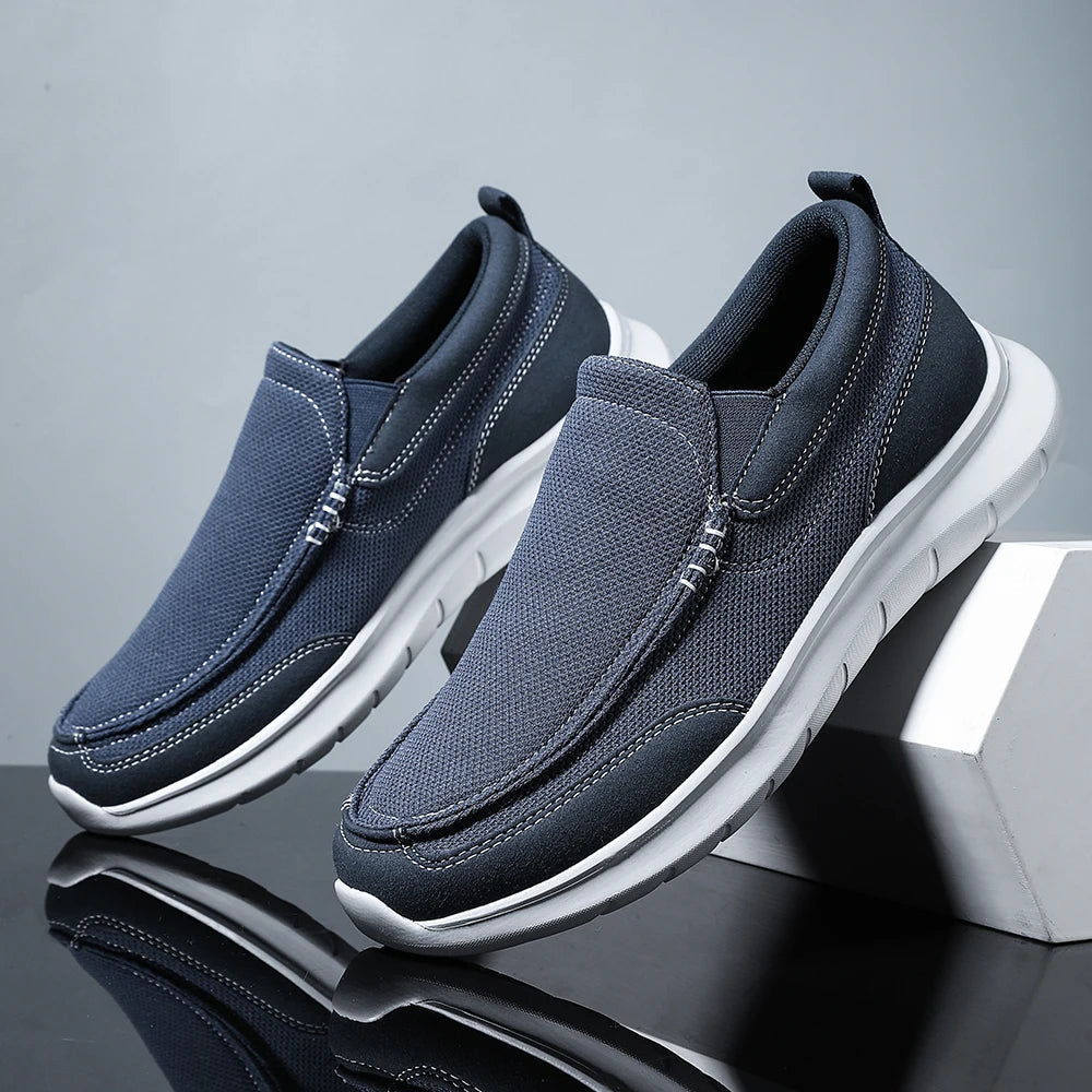 Beige mesh suede-panel slip-on loafers with cushioned flexible sole for all-day comfort
