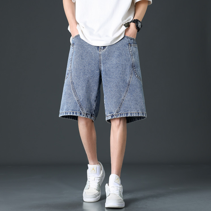 Acid-wash wide-leg denim shorts in retro blue streetwear style with relaxed silhouette