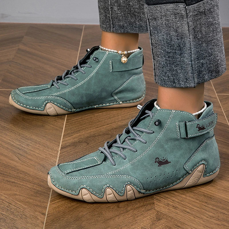 White genuine leather high-top sneakers with contrast stitching and signature wave-sole grip