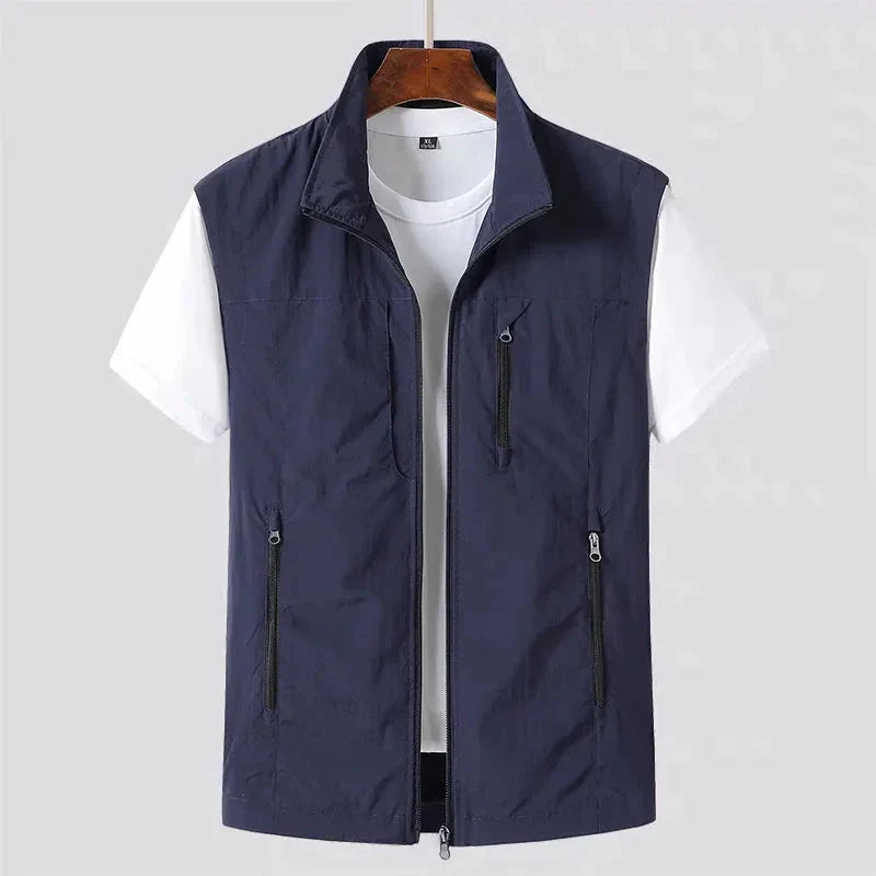 Men's navy utility vest wind-resistant zip pockets slim urban fit lightweight outdoor layer