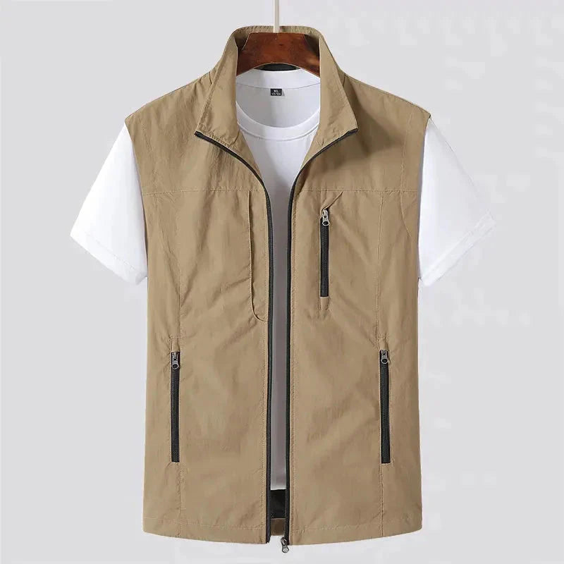 Men's navy blue utility vest wind-resistant slim fit with multiple zippered pockets for urban wear