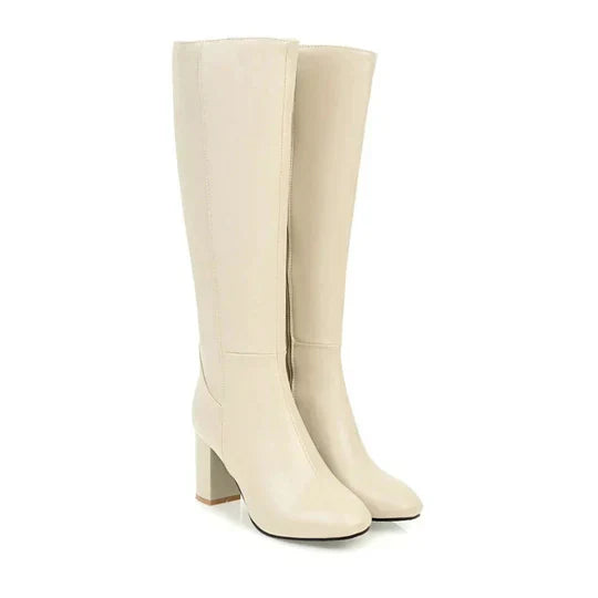 Black knee-high stiletto heeled boots for women with sleek shaft and leg-elongating silhouette