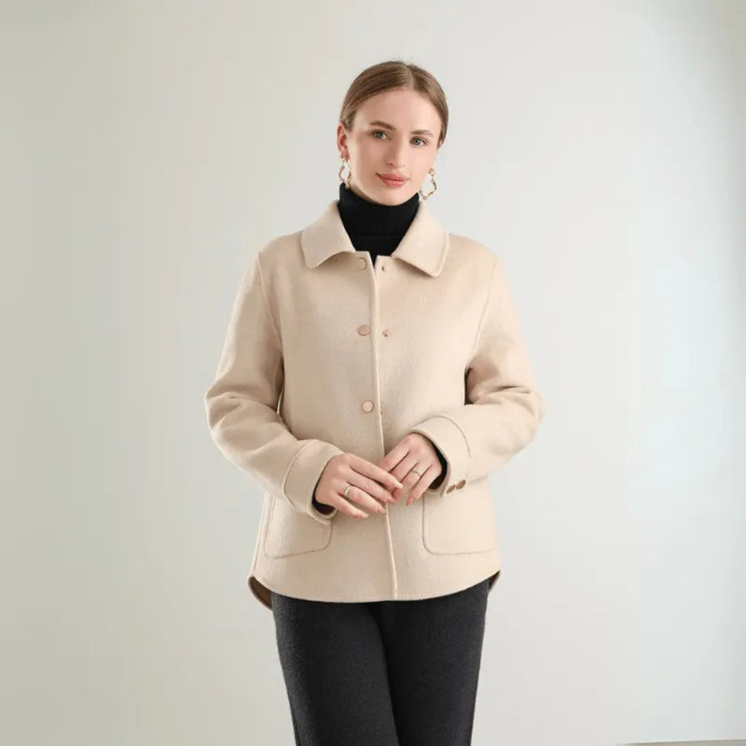 Women's reversible wool coat in neutral tones, classic tailored silhouette with double-sided design