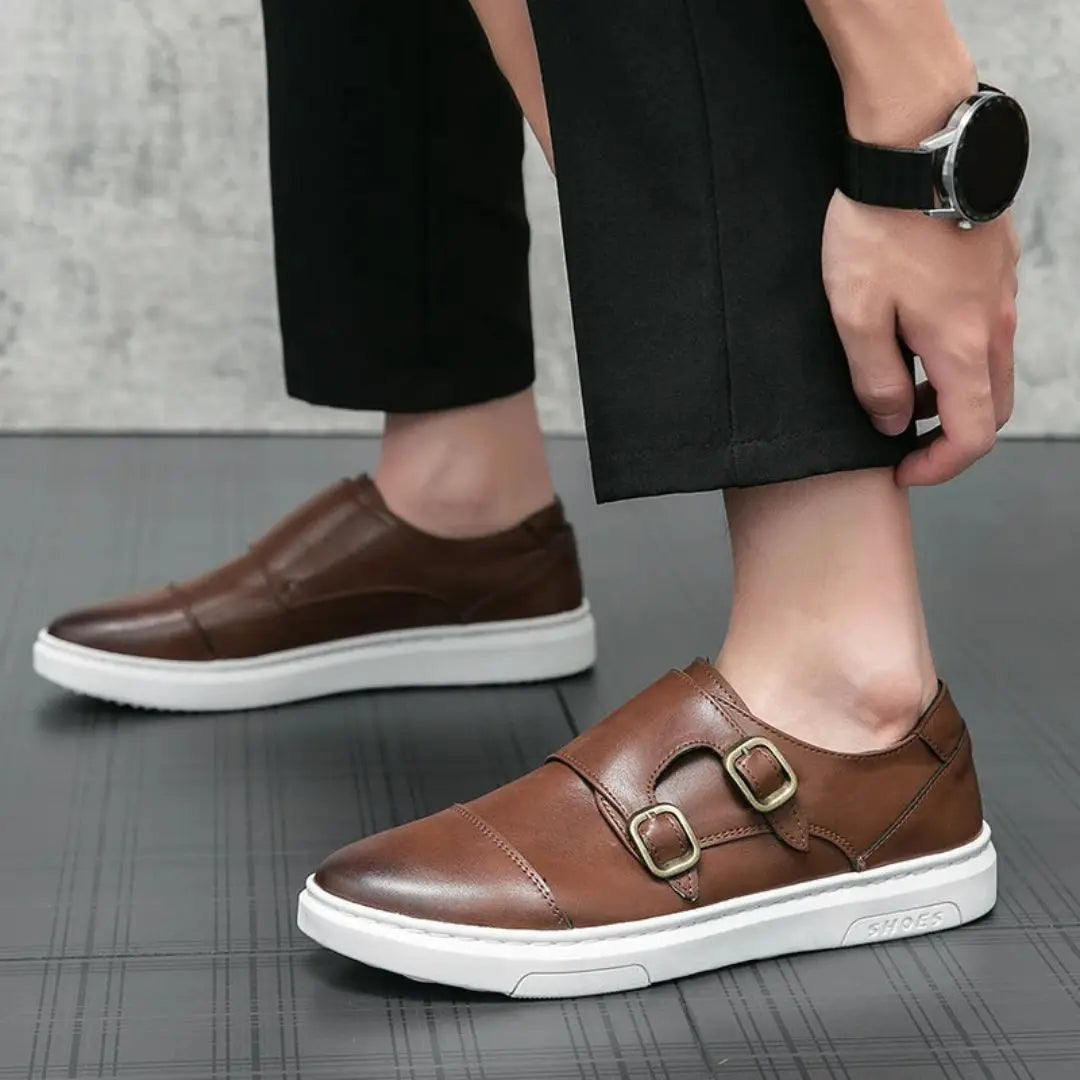 Black professional loafers with leather-look upper, dual buckle monk-strap design, and breathable lining