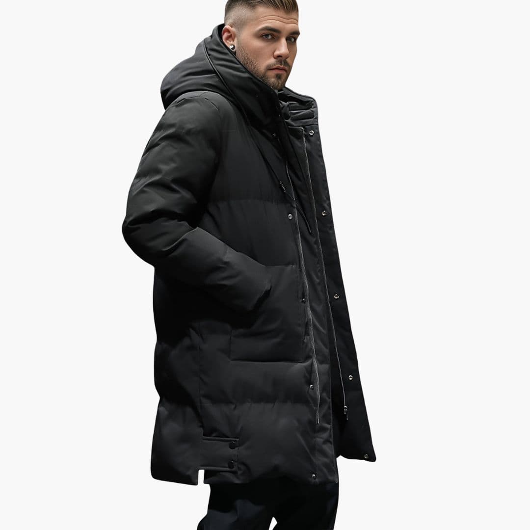Men's long insulated down jacket with hood, front zipper, snap buttons, and side pockets for winter