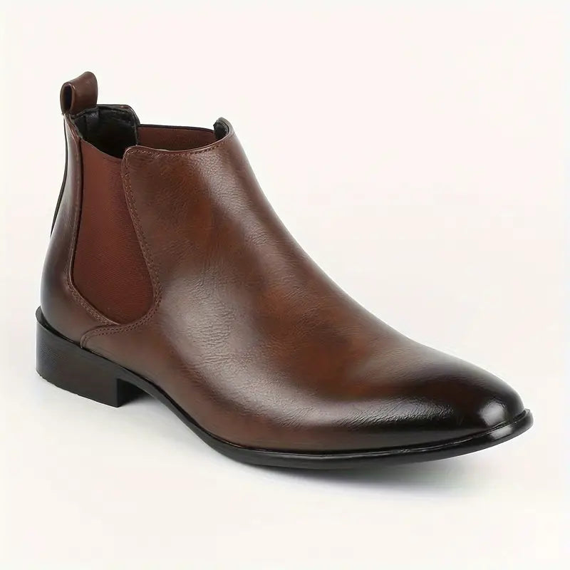Black pointed-toe Chelsea boots with elastic panels, cushioned insole, sleek minimalist finish for professionals