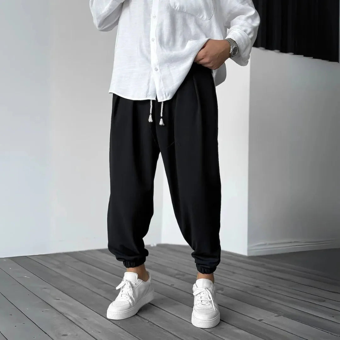 Men's tapered joggers soft flowing fabric pleated front elastic cuffs smart-casual relaxed fit