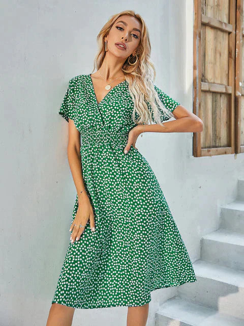 Women's polka dot A-line dress with flattering V-neck wrap, knee-length versatile day-to-night style