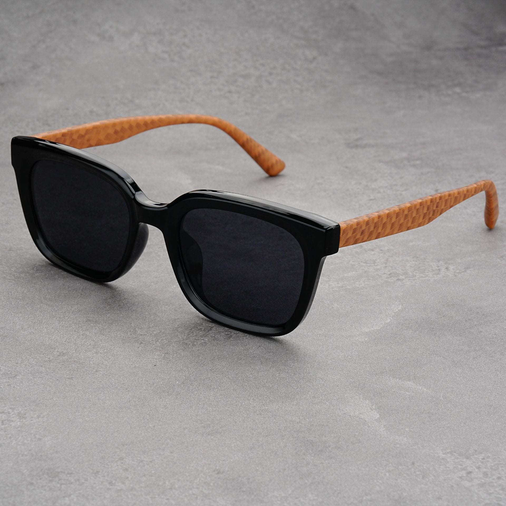 Square sunglasses UV-blocking lenses lightweight woven temples bold silhouette travel-ready eyewear
