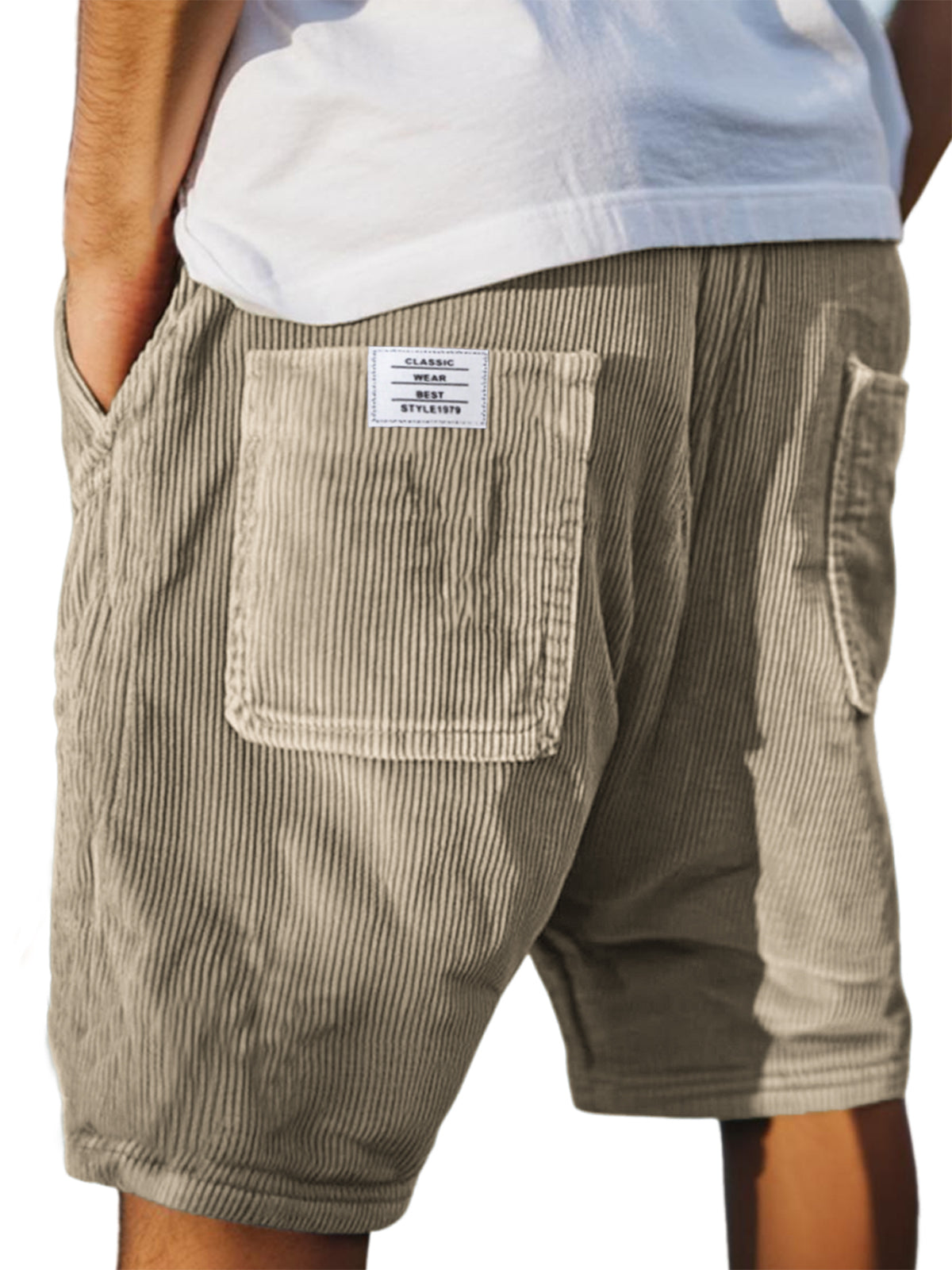 Men's gray jersey shorts with drawstring waistband, relaxed casual fit with textured fabric