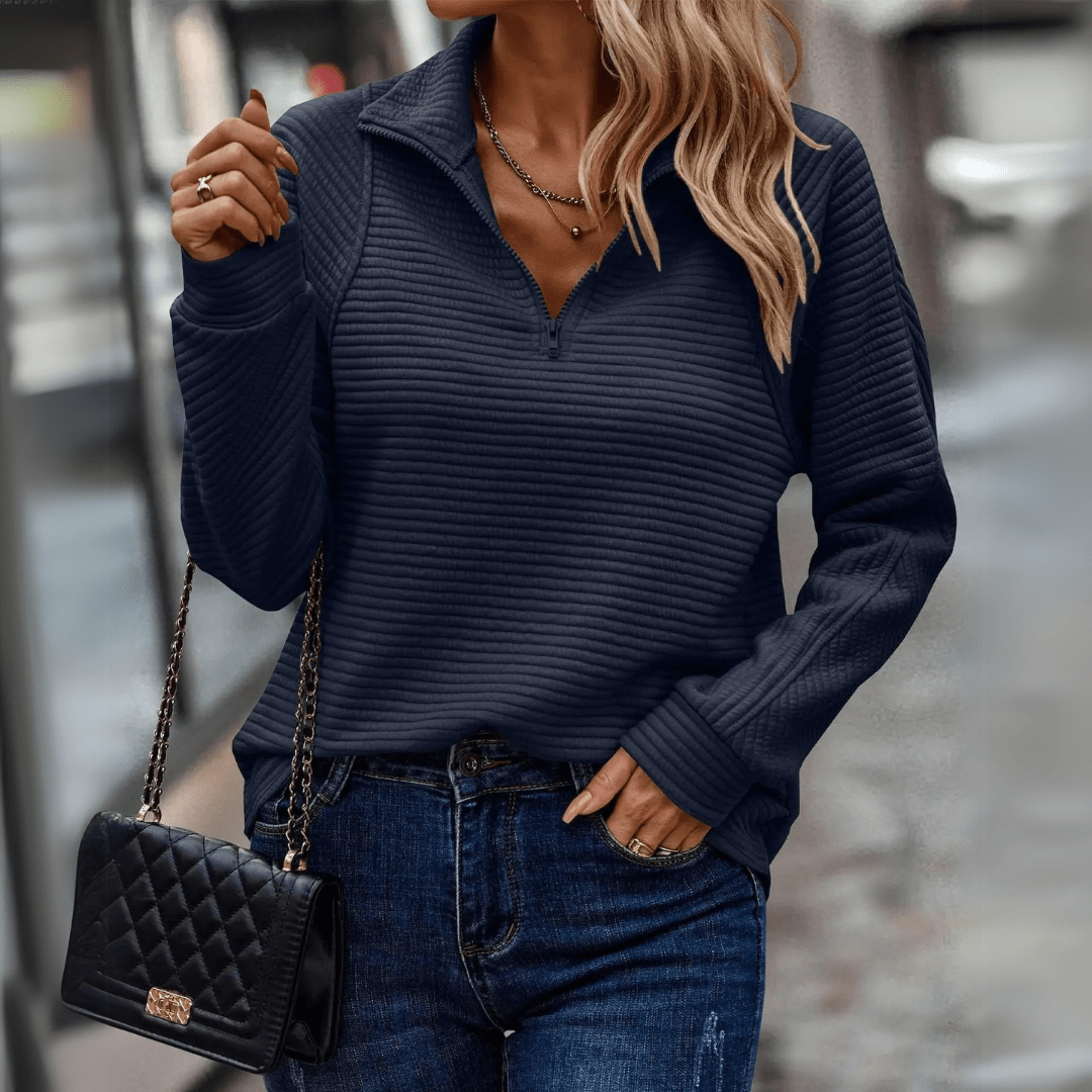 Women's ribbed half-zip pullover sweater with soft textured knit and minimalist style
