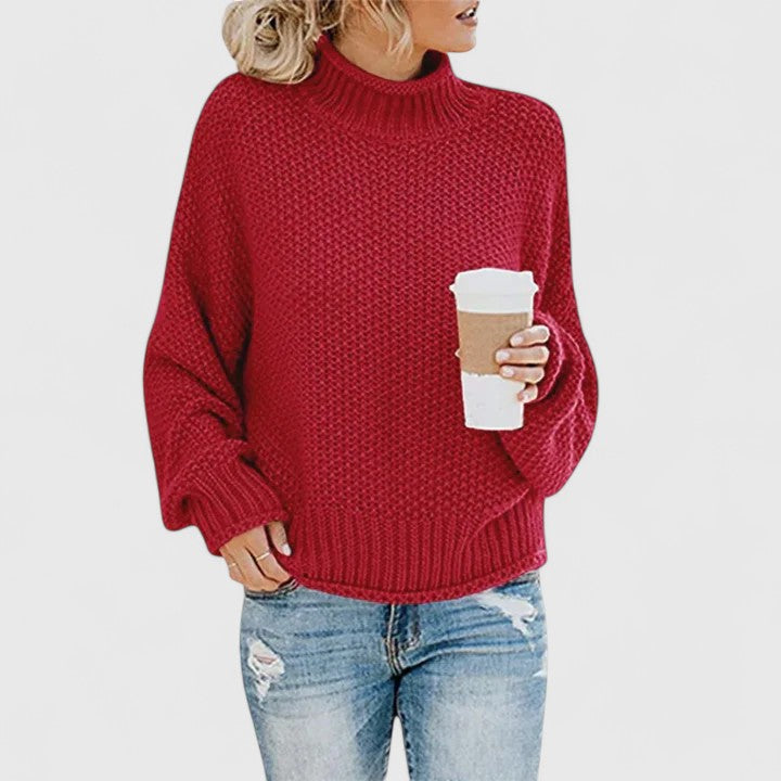 Women's chunky knit sweater relaxed fit high neck cozy layering essential in neutral tones
