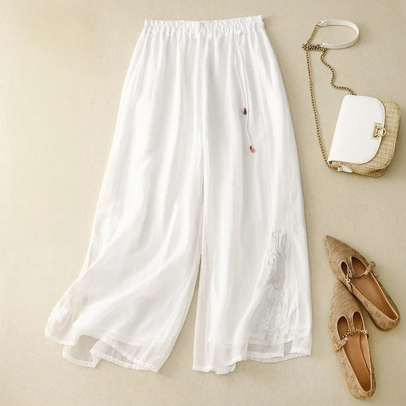 Women's wide-leg linen pants with soft floral embroidery details, breezy relaxed fit, everyday boho style