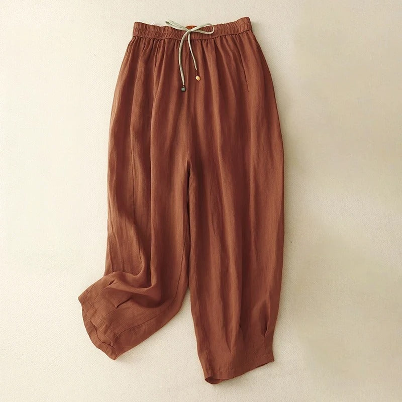 Beige relaxed tapered linen blend pants with elastic waistband and drawstring for everyday comfort