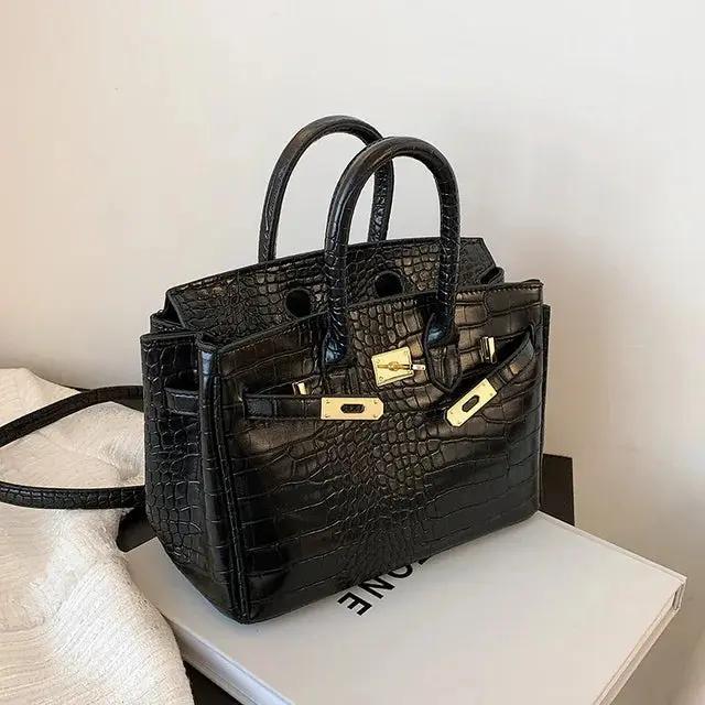 Elegant women's handbag in neutral tone, spacious interior with multiple organized compartments