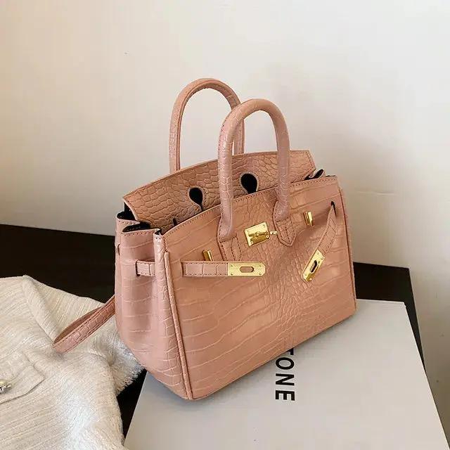 Elegant women's handbag in classic silhouette with spacious interior and multiple organized compartments