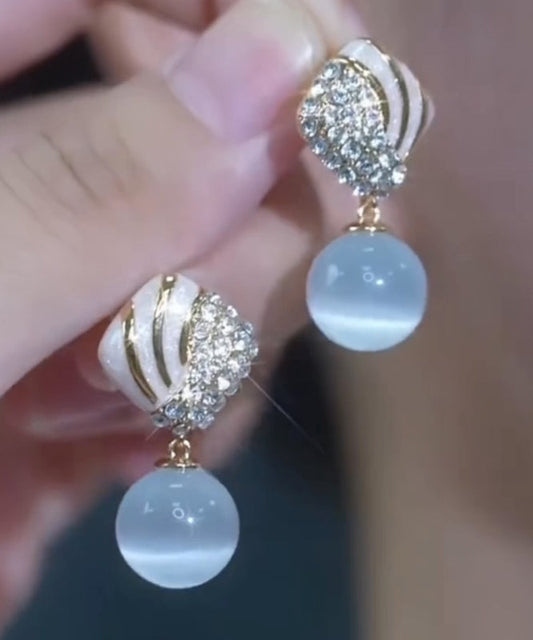 Boucles d'oreilles pendantes élégantes en alliage bleu clair avec pierre œil de chat en zircon - Urbann-Vibe
