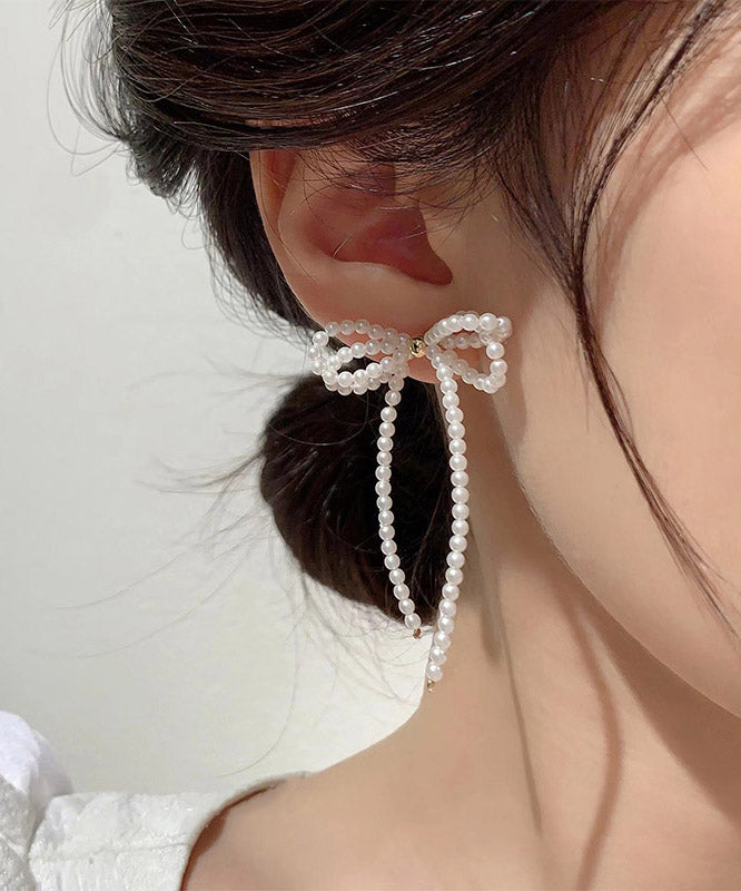 Boucles d'oreilles pendantes élégantes en alliage blanc avec perles et pampilles papillon - Urbann-Vibe