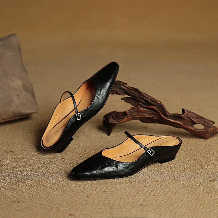 Women's black genuine leather pointed flats with Mary Jane strap, sleek professional style