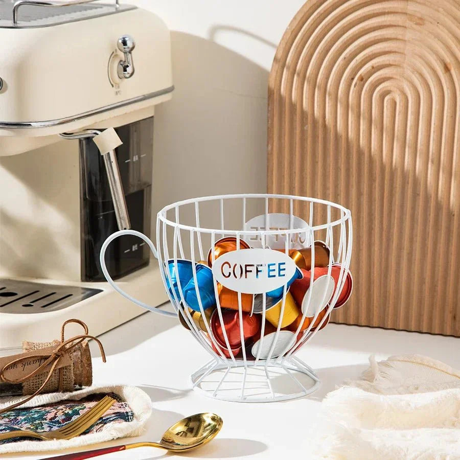 Modern wire coffee pod holder with handle featuring bold COFFEE cutout, sleek open-wire cup-shaped design