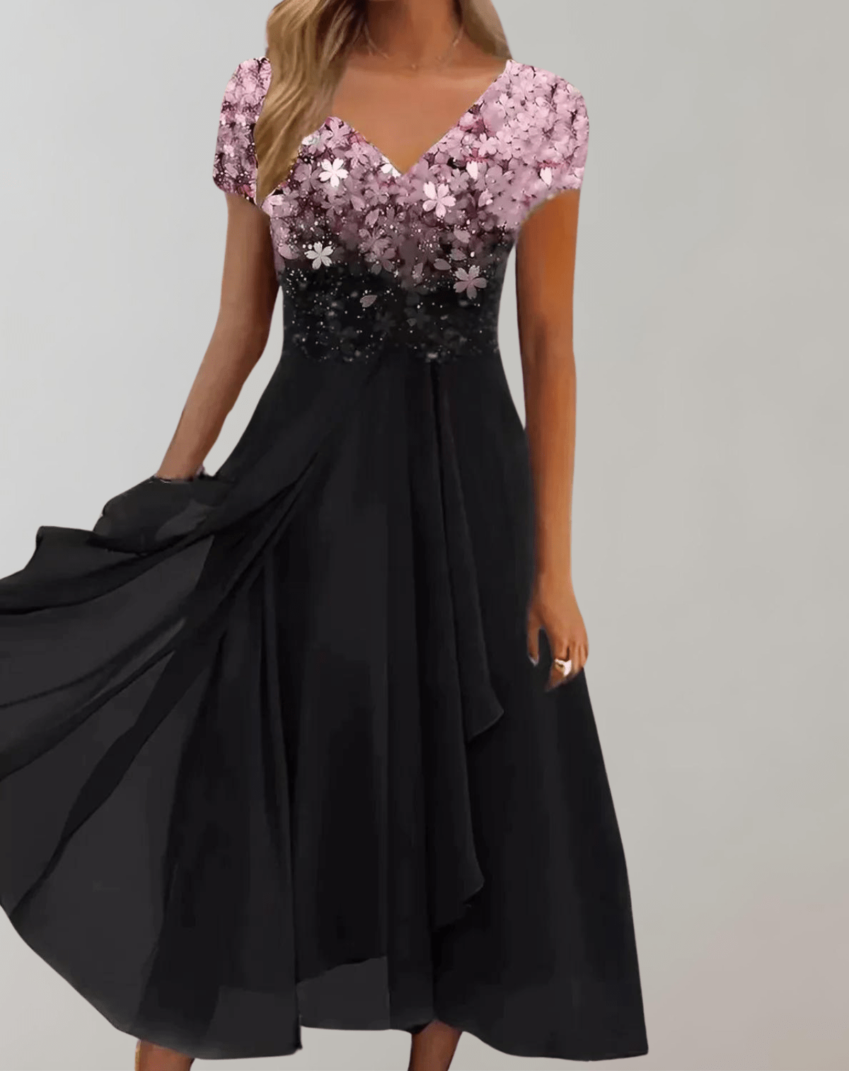Women's black ombre chiffon midi dress with blue floral embellished bodice and flowing cocktail silhouette