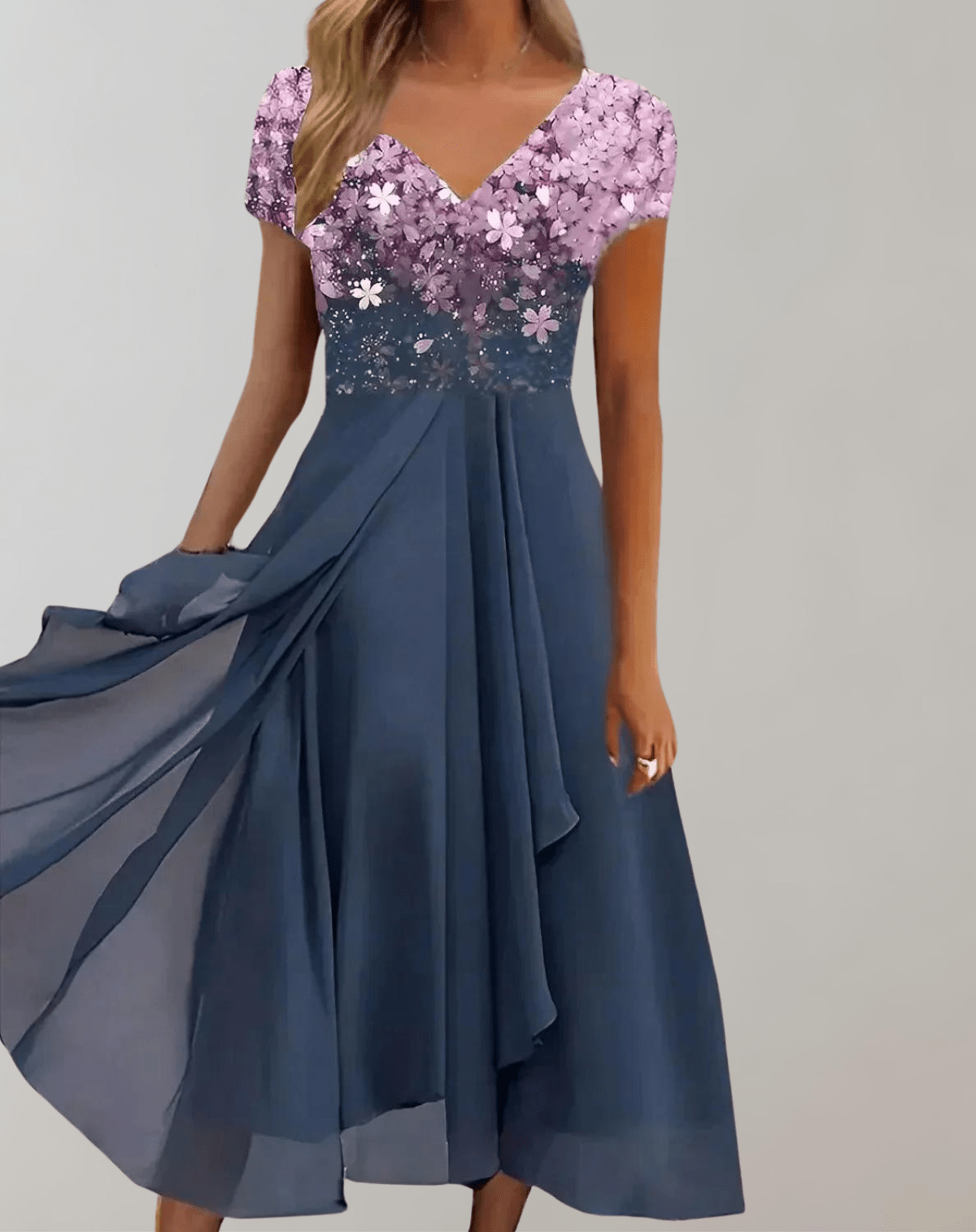 Women's black ombre chiffon midi dress with blue floral bodice embellishments and flowing V-neckline