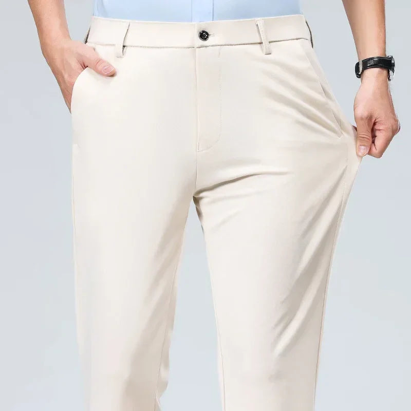 Slim fit men's dress trousers in solid color, lightweight breathable fabric with elastic waistband