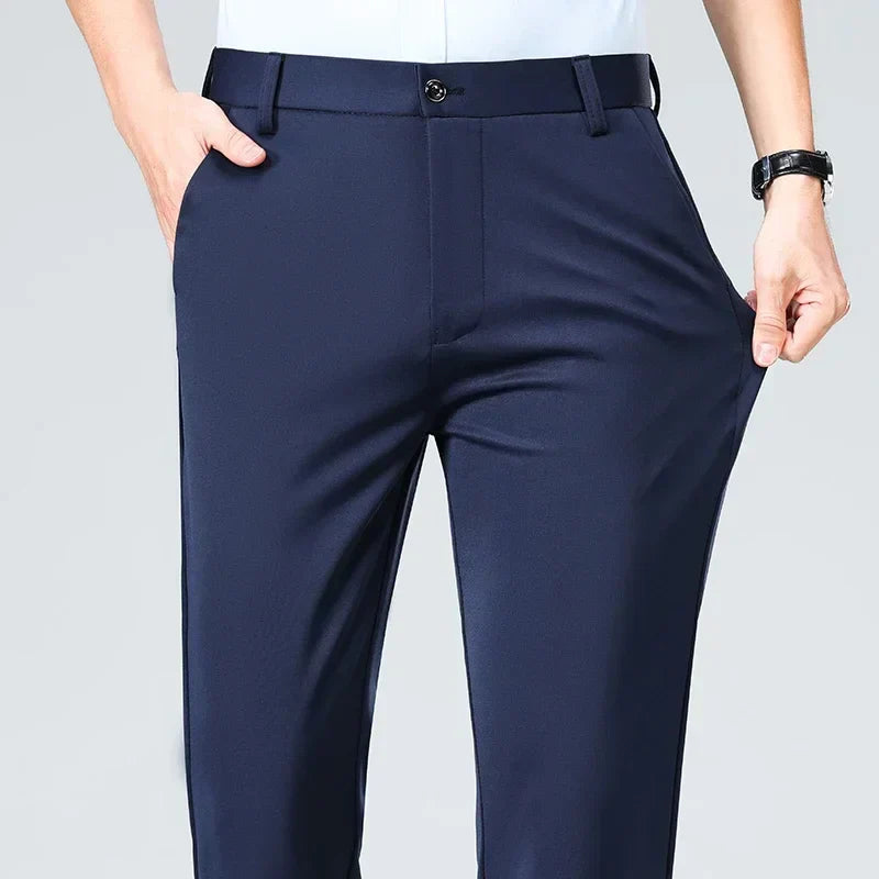 Slim fit men's dress trousers in solid color, lightweight breathable fabric with elastic waistband