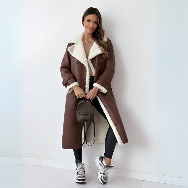 Unisex black PU leather winter jacket with warm fleece lining, sleek modern cut for everyday elegance