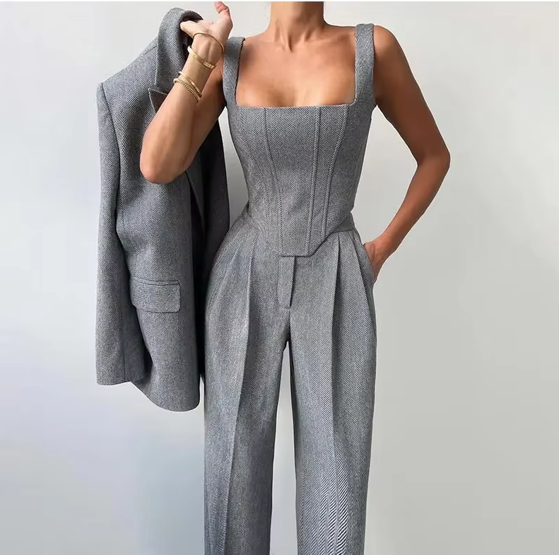 Women's ivory 3-piece tailored suit set with blazer, pants, and coordinating piece for office wear