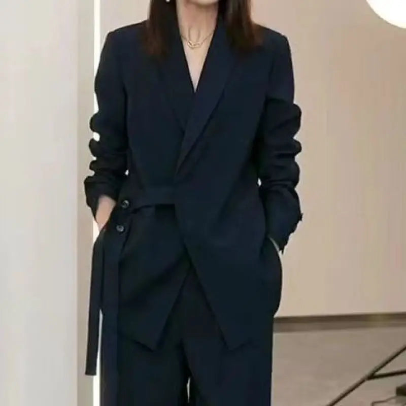 Women's chic loose blazer and wide-leg pants suit set in elegant office-ready style with elastic waist