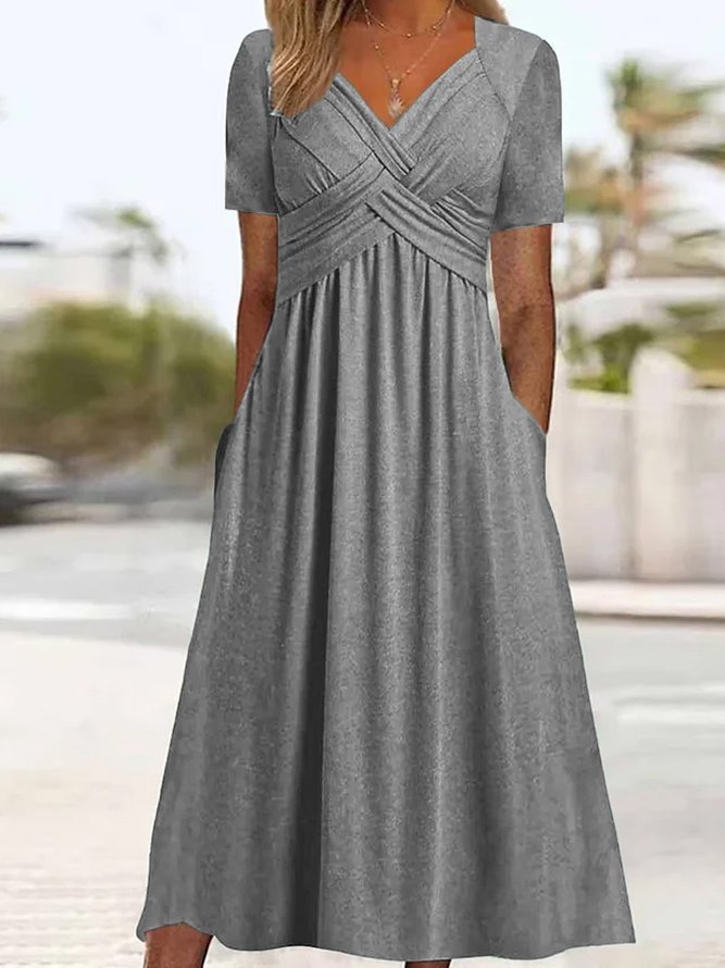 Women's lightweight flowy maxi wrap dress with V-neck, pockets, and elegant summer silhouette