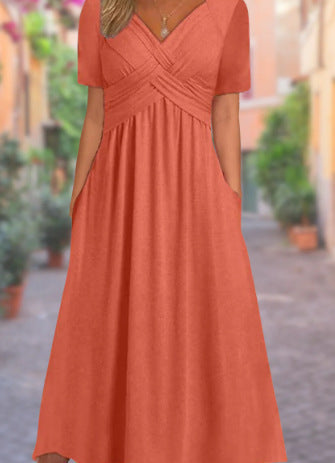 Women's lightweight flowy maxi wrap dress with deep V-neck, pockets, and elegant summer silhouette