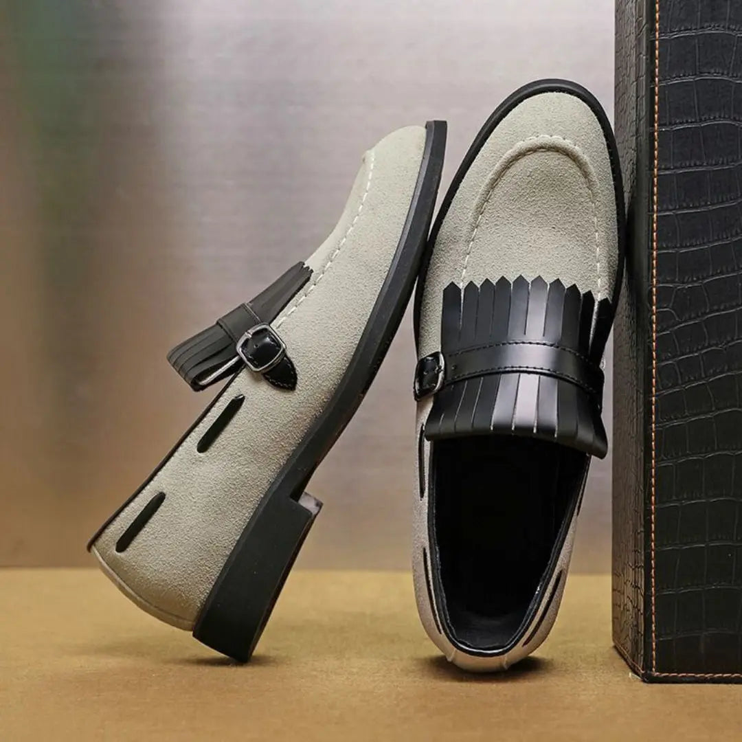 Men's brown suede buckle loafers with fringe detail and cushioned insoles for all-day comfort