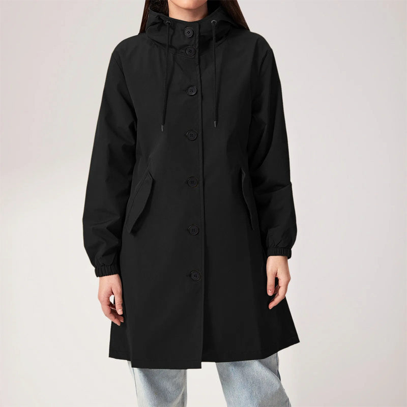 Women's beige mid-length hooded trench coat with polished lines, timeless elegant silhouette