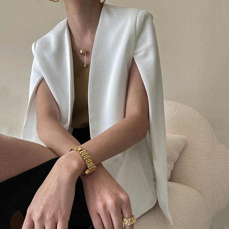 Elegant sleeveless cape cover-up jacket in lightweight fabric, open-front style for wedding and evening events