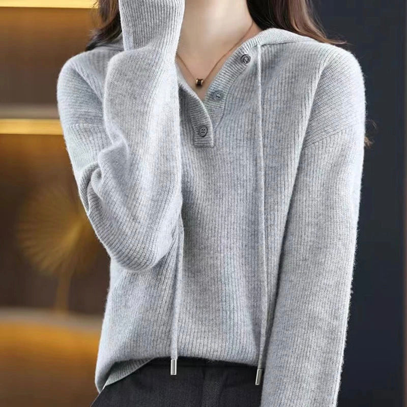 Women's ivory cashmere hoodie sweater with V-neck, drawstring hood, and luxurious soft knit finish