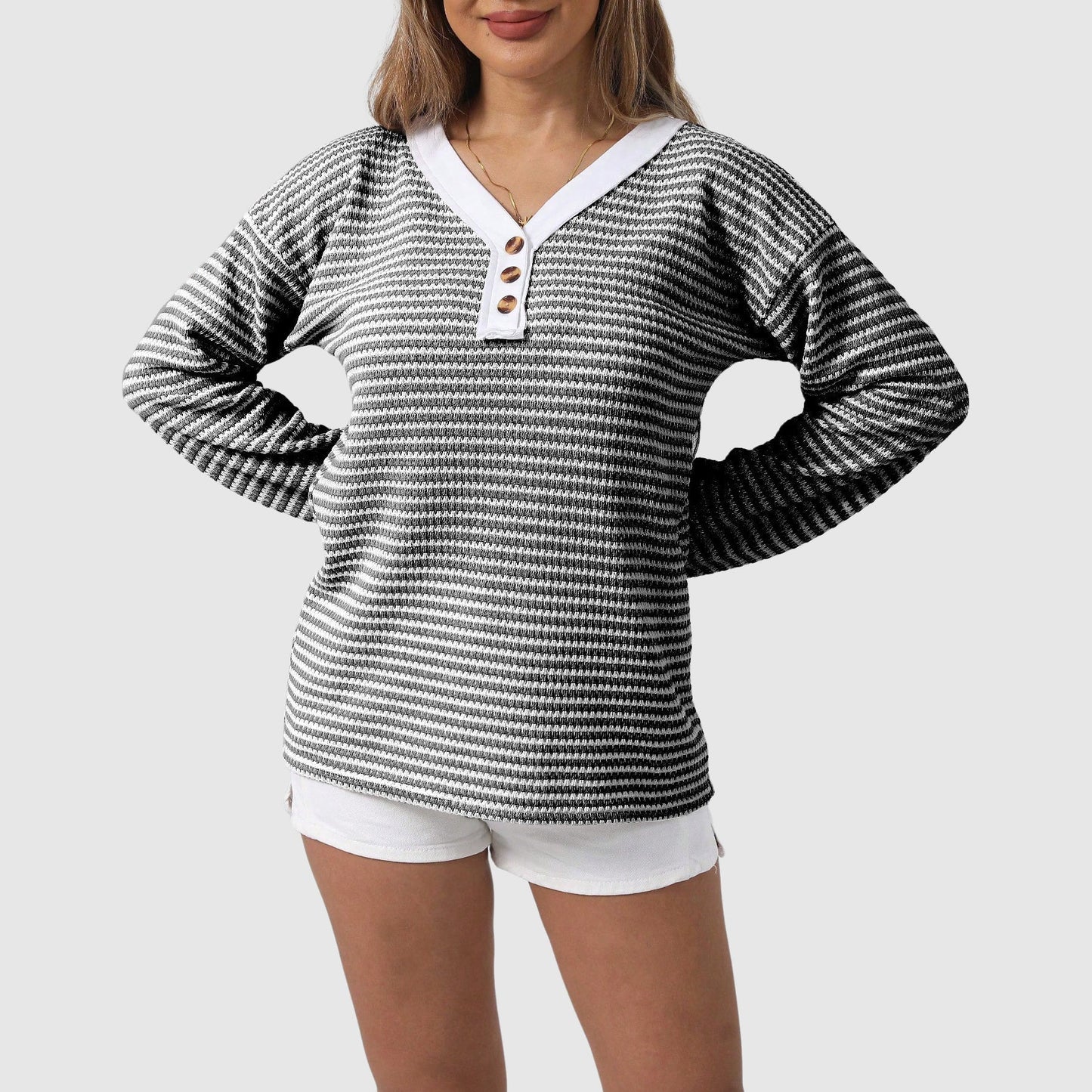 Women's cozy V-neck color-block knit sweater with button detailing, autumn style