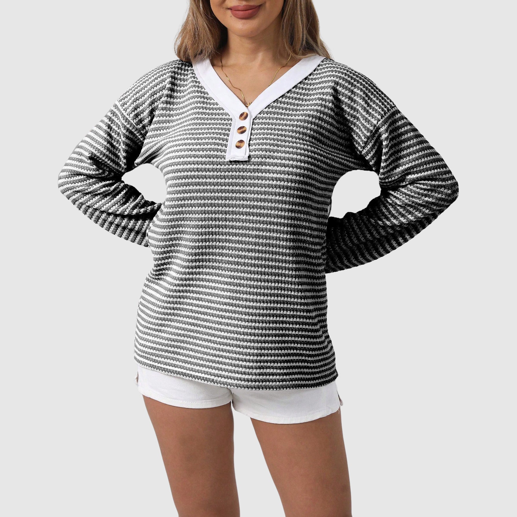 Women's cozy V-neck color-block knit sweater with button detailing, autumn style